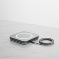 Sleek wireless charging pad on a white surface